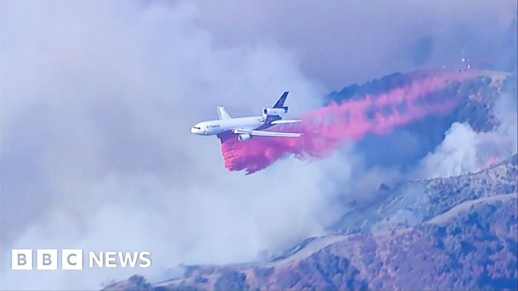 Watch: Huge clouds of water and fire retardant dumped on LA wildfires